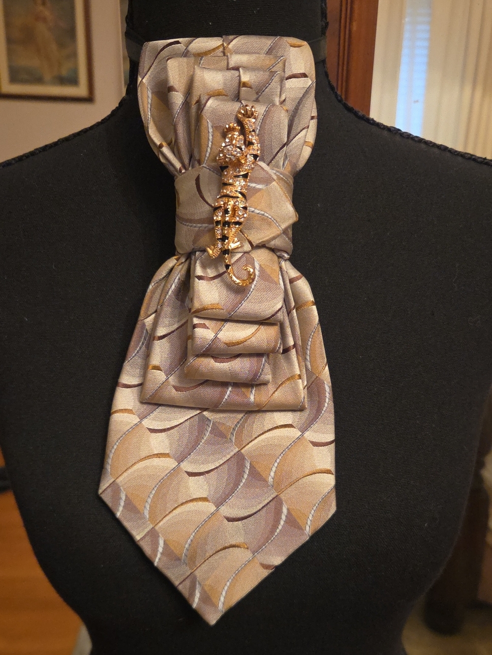 Elegant Beige Patterned Ascot with Gold Brooch